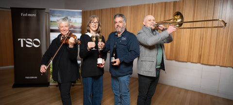 Image of two TSO musicians with Matt and Vanessa Dunbabin.