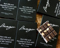 Bangor chocolate bars with sea salt caramel flavor on a wooden surface. Handmade Tasmanian chocolate, a perfect gift.