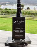 Bangor chocolate with a bottle of Bangor wine against a scenic background at Bangor Vineyard Shed