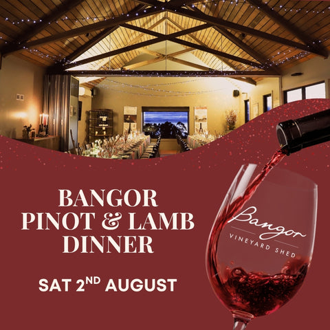 Advertisement for Bangor Pinot & Lamb Dinner with a wine glass and pouring action, set against a warm-toned interior background.