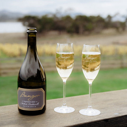Bottle of Bangor sparkling wine and two champagne glasses